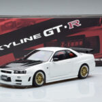 Nissan Skyline GT-R R34 Nismo Z-Tune Biely MotorHelix 1:18 - image 11 of 11