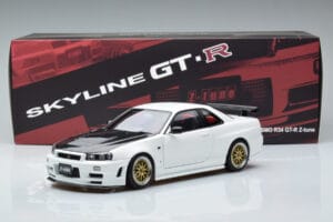 Nissan Skyline GT-R R34 Nismo Z-Tune Biely MotorHelix 1:18 M83407 Kov – obrázok 11 z 11
