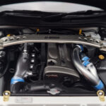 Nissan Skyline GT-R R34 Nismo Z-Tune Biely MotorHelix 1:18 - image 9 of 11