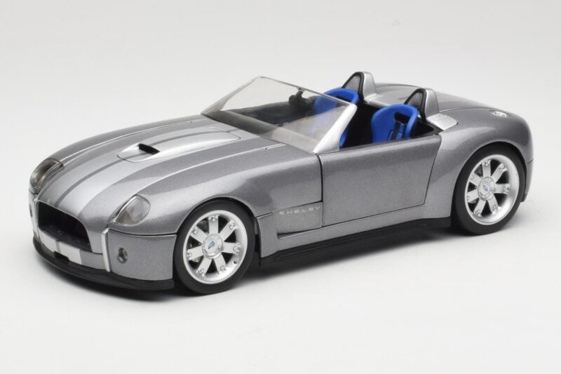 Shelby Cobra Kabriolet Grey Metallic Hot Wheels 1:18 G7220 Kov