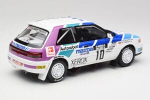 Mazda 323 GTX #10 T. Makinen / S. Harjanne 1000 Lakes Rally 1991 Otto 1:18 OT1099 Živica – obrázok 2 z 6
