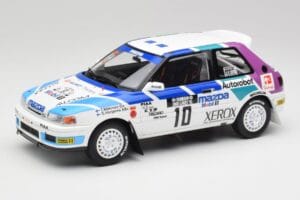 Mazda 323 GTX #10 T. Makinen / S. Harjanne 1000 Lakes Rally 1991 Otto 1:18 OT1099 Živica