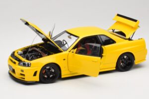 Nissan Skyline GT-R R34 Customized Version Žltý MotorHelix 1:18 M83412 Kov – obrázok 2 z 8