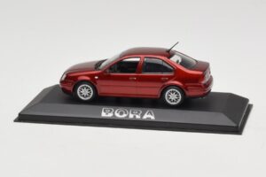 Volkswagen Bora Mk4 Red Metallic Minichamps 1:43 VW003 Kov