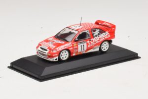 Ford Escort Cosworth Toshiba #11 A. Vatanen / Freeman 1994 Minichamps 1:43 430981811 Kov – obrázok 2 z 4